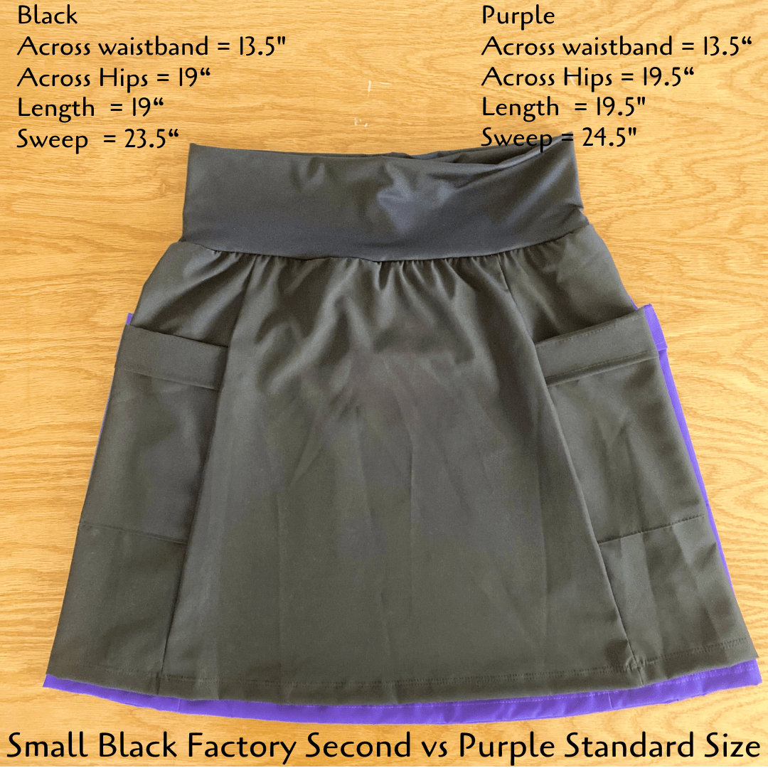 Black and purple skirt with measurements on a wooden surface