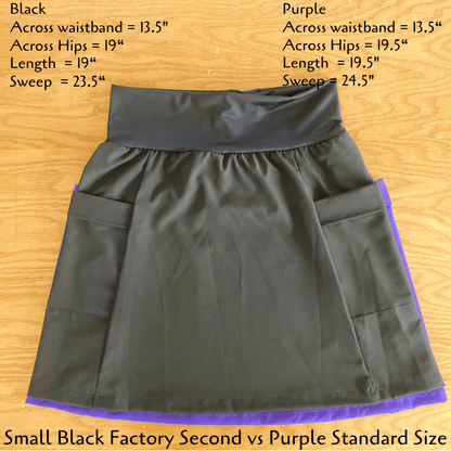Black and purple skirt with measurements on a wooden surface