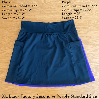 Blue and purple skirt on a wooden surface with measurements displayed.