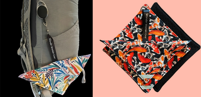 Colorful patterned pouches attached to a backpack on a black and pink background